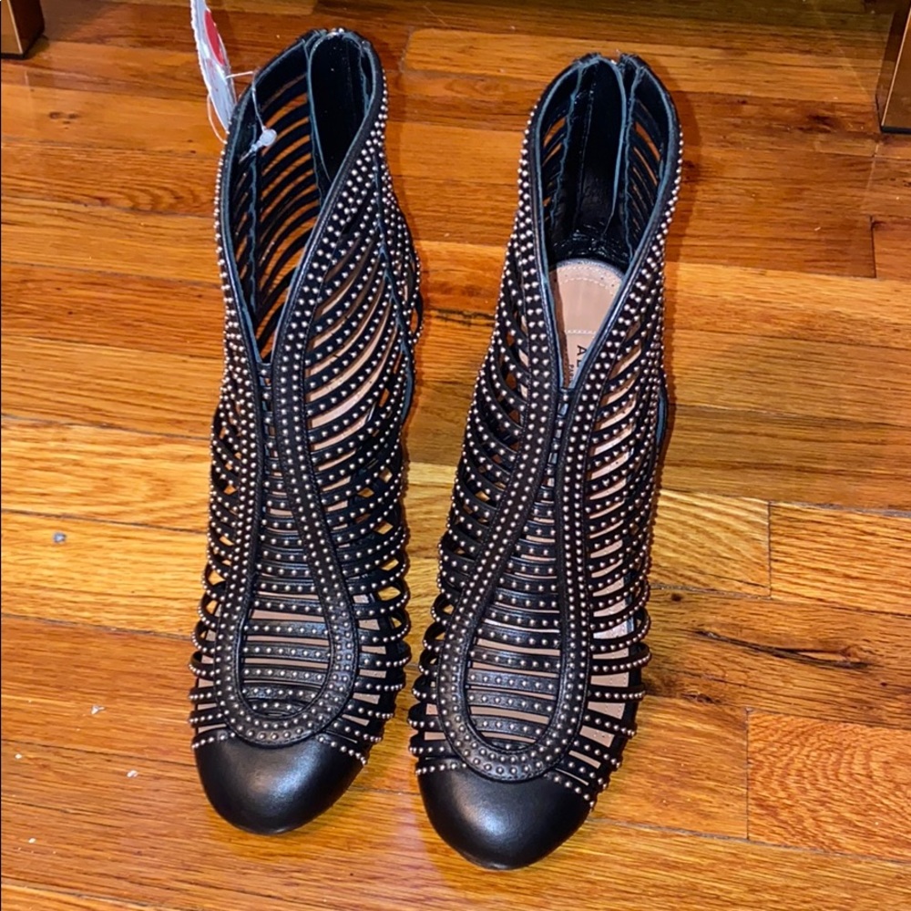ALAIA STUDDED ANKLE BOOTS